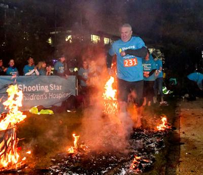 With a spark of courage hot-stepping heroes took on the Fire Walk